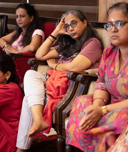 Participants resting deeply in a chair during inner work