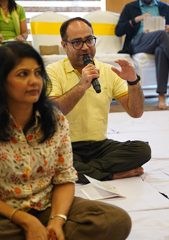 Participant sharing on the microphone in a sharing circle